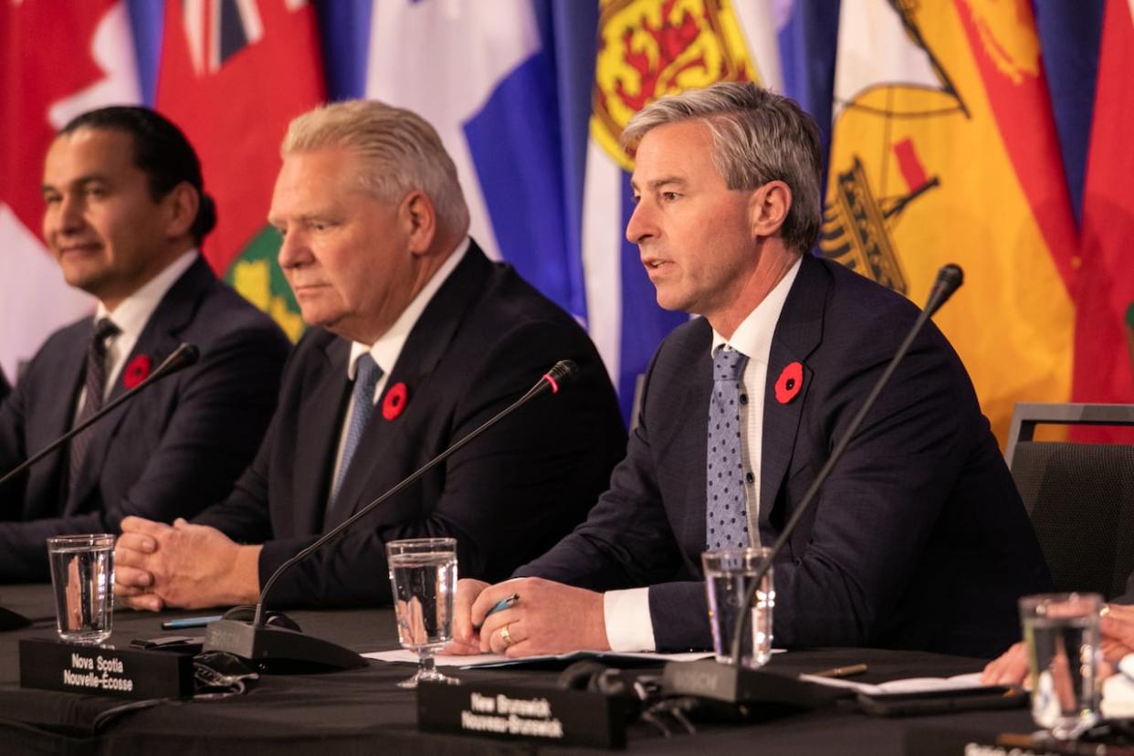 Nova Scotia Premier Tim Houston, right, speaks during a press conference at the meeting of the Council of the Federation in Halifax on Monday, Nov. 6, 2023. (Kelly Clark/The Canadian Press - image credit)