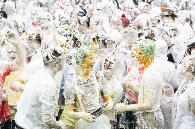 Hundreds of students take part in the traditional Raisin Monday foam fight on St Salvator’s Lower College Lawn at the University of St Andrews in Fife