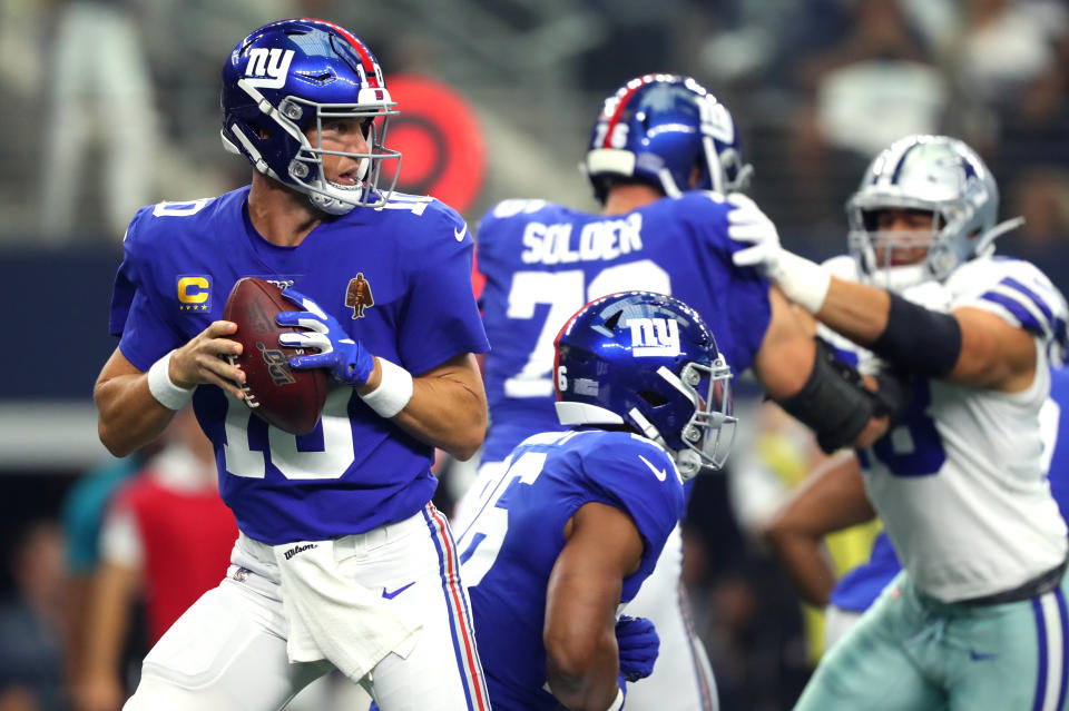 Quarterback Eli Manning #10 of the New York Giants looks to pass during the first quarter of the game against the Dallas Cowboys at AT&T Stadium on September 08, 2019 in Arlington, Texas. (Photo by Tom Pennington/Getty Images)