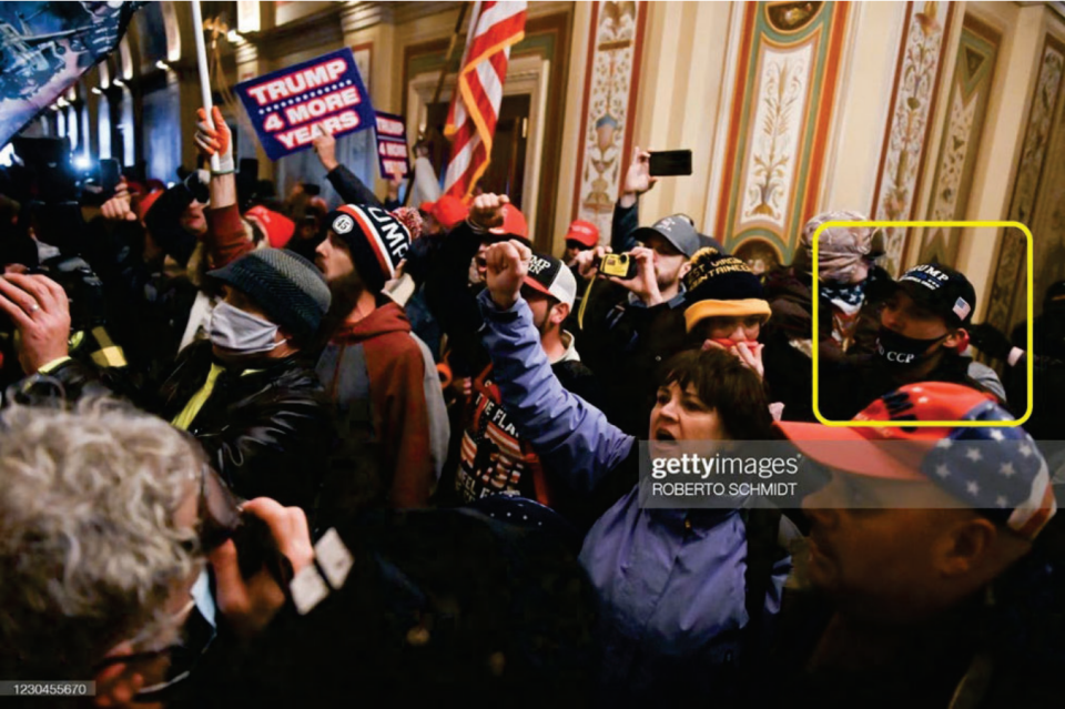 Jack Chambers, highlighted in yellow, inside the U.S. Capitol on Jan. 6, 2021.