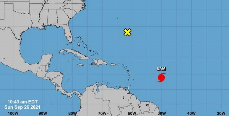 The two weather systems in the Atlantic Ocean as of 10:43 a.m. Sunday