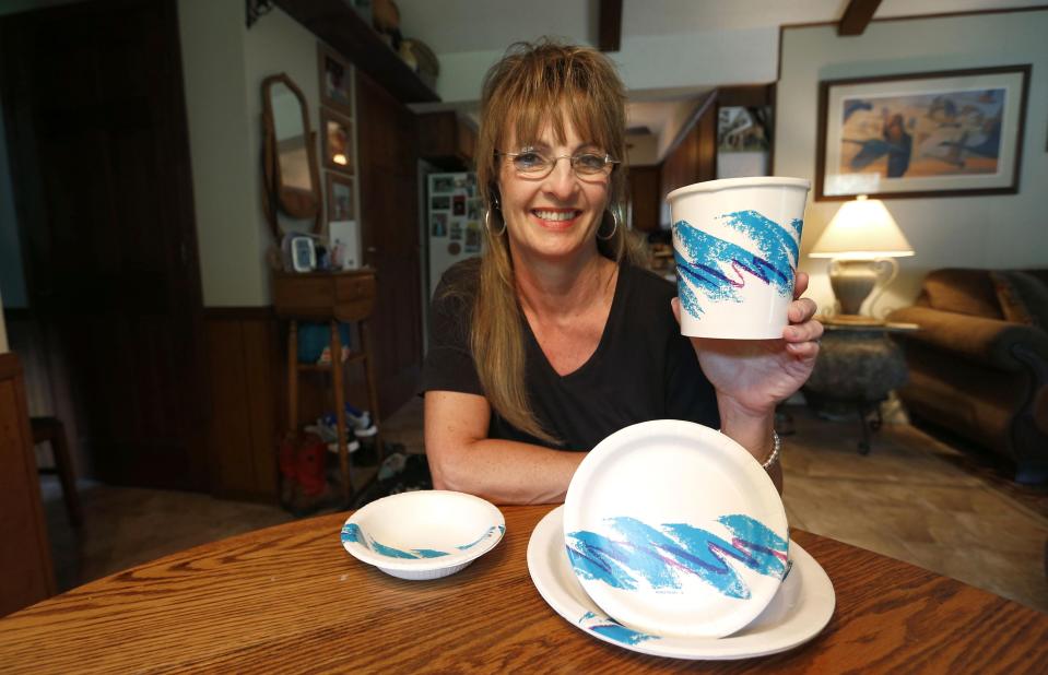 Gina Ekiss designed the Jazz pattern found on plates, cups, and a number of other disposable items. She keeps some products with the design at her home in Aurora.