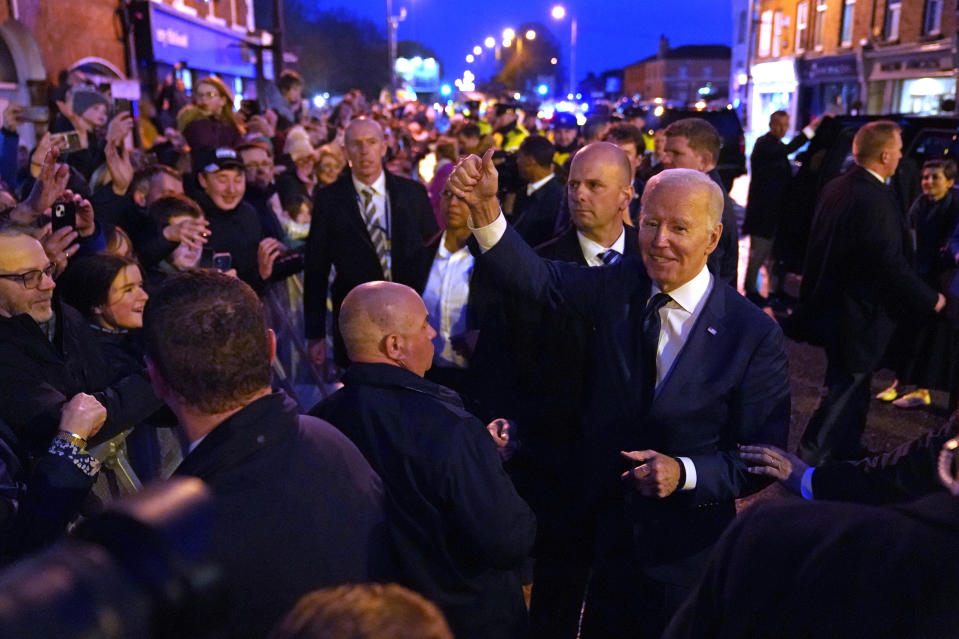 President Joe Biden is greeted by crowds as he leaves after speaking at the Windsor Bar and Restaurant in Dundalk, Ireland, Wednesday, April 12, 2023. (AP Photo/Patrick Semansky)