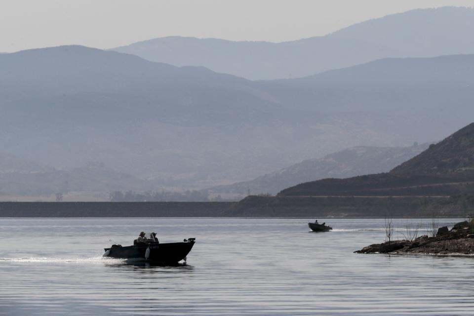 Two boats on a lake.