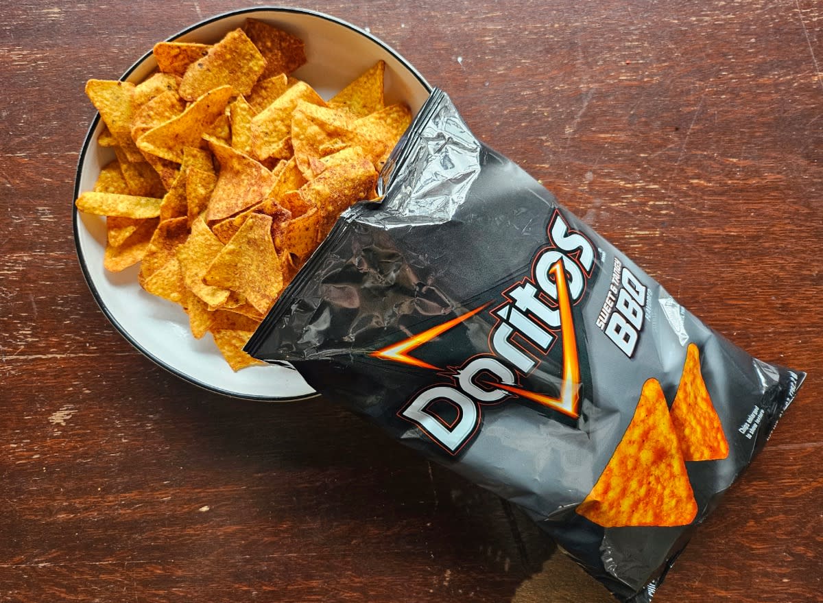 doritos bbq chips in a bag and a bowl.