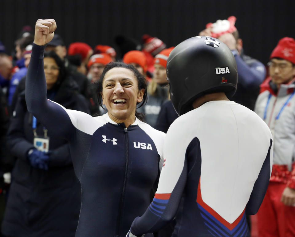 Driver Elana Meyers Taylor, left, and Lauren Gibbs of the United States celebrate after their silver medal winning heat during the women’s two-man bobsled final at the 2018 Winter Olympics in PyeongChang, South Korea, Wednesday, Feb. 21, 2018. (AP)