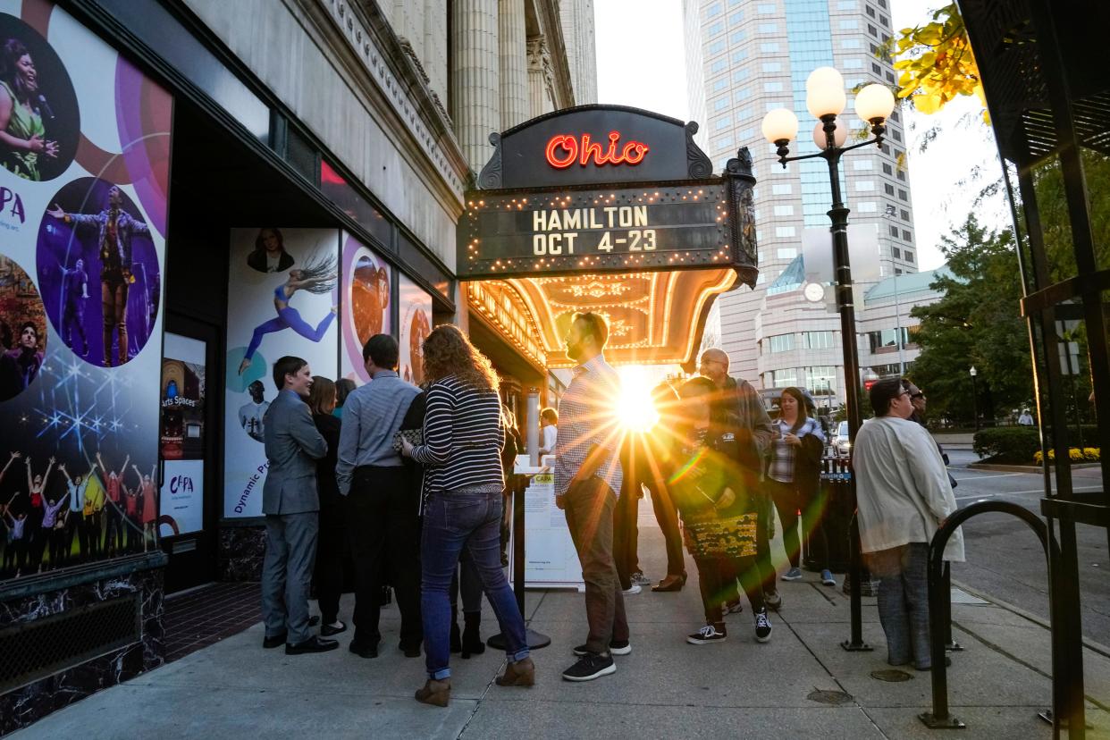Theatergoers wait in line at the Ohio Theatre for the opening night of "Hamilton." The Broadway In Columbus musical runs through Oct. 23.