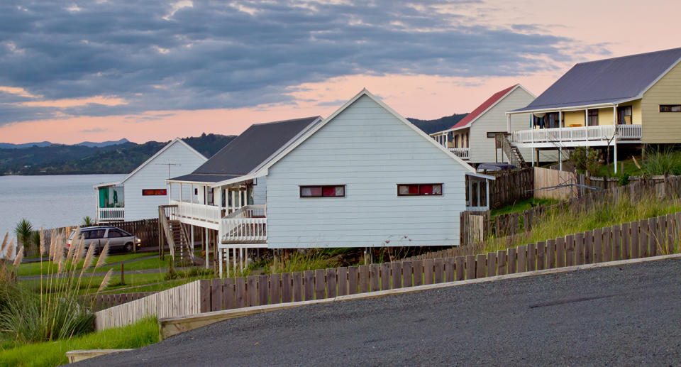 New Zealand bans foreigners from buying homes