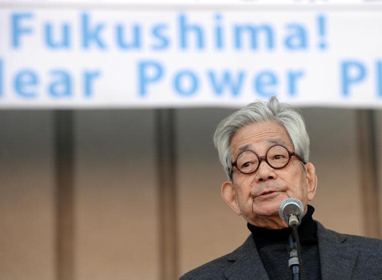 Japanese author Kenzaburo Oe delivers a speech during an anti-nuclear power plant rally in Tokyo on March 15, 2014