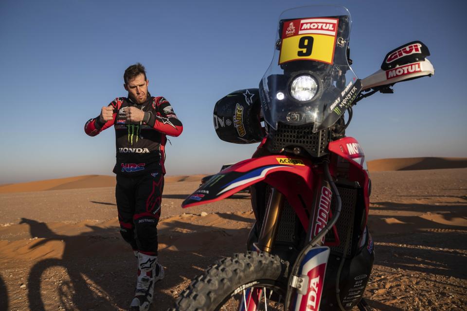 Ricky Brabec of United States rides his Honda motorbike warms up before the start of stage twelve of the Dakar Rally between Haradth and Qiddiya, Saudi Arabia, Friday, Jan. 17, 2020. (AP Photo/Bernat Armangue)