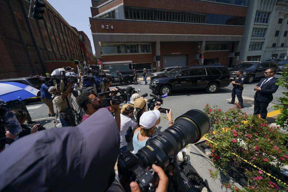 Reporters huddle as a vehicle, top right, leaves with <span class="caas-xray-inline-tooltip"><span class="caas-xray-inline caas-xray-entity caas-xray-pill rapid-nonanchor-lt" data-entity-id="Joe_Biden" data-ylk="cid:Joe_Biden;pos:2;elmt:wiki;sec:pill-inline-entity;elm:pill-inline-text;itc:1;cat:OfficeHolder;" tabindex="0" aria-haspopup="dialog"><a href="https://search.yahoo.com/search?p=Joe%20Biden" data-i13n="cid:Joe_Biden;pos:2;elmt:wiki;sec:pill-inline-entity;elm:pill-inline-text;itc:1;cat:OfficeHolder;" tabindex="-1" data-ylk="slk:President Joe Biden;cid:Joe_Biden;pos:2;elmt:wiki;sec:pill-inline-entity;elm:pill-inline-text;itc:1;cat:OfficeHolder;" class="link ">President Joe Biden</a></span></span>’s son, Hunter Biden, after his court appearance on July 26, 2023, in Wilmington, Delaware. <a href="https://newsroom.ap.org/detail/HunterBiden/7aa9f7be0c914aae8cf8e277c8550a44/photo?Query=Hunter%20Biden&mediaType=photo&sortBy=arrivaldatetime:desc&dateRange=Anytime&totalCount=665&currentItemNo=1" rel="nofollow noopener" target="_blank" data-ylk="slk:AP Photo/Julio Cortez;elm:context_link;itc:0;sec:content-canvas" class="link ">AP Photo/Julio Cortez</a>