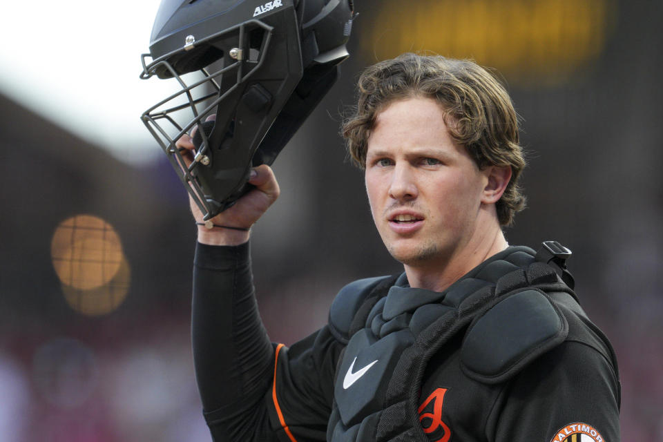 Baltimore Orioles catcher Adley Rutschman plays during a baseball game against the Cincinnati Reds Friday, July 29, 2022, in Cincinnati.  (AP Photo/Jeff Dean)