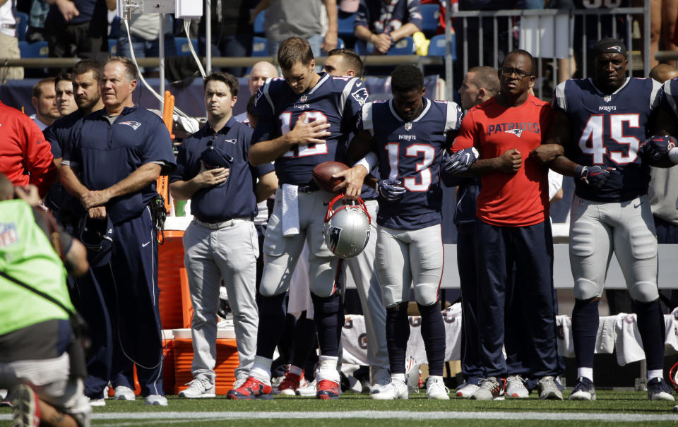 <p>New England Patriots head coach Bill Belichick, left, and Tom Brady (12) Phillip Dorsett (13) Matthew Slater, second from right, and David Harris (45) stand during the national anthem before an NFL football game against the Houston Texans, Sunday, Sept. 24, 2017, in Foxborough, Mass. (AP Photo/Steven Senne) </p>