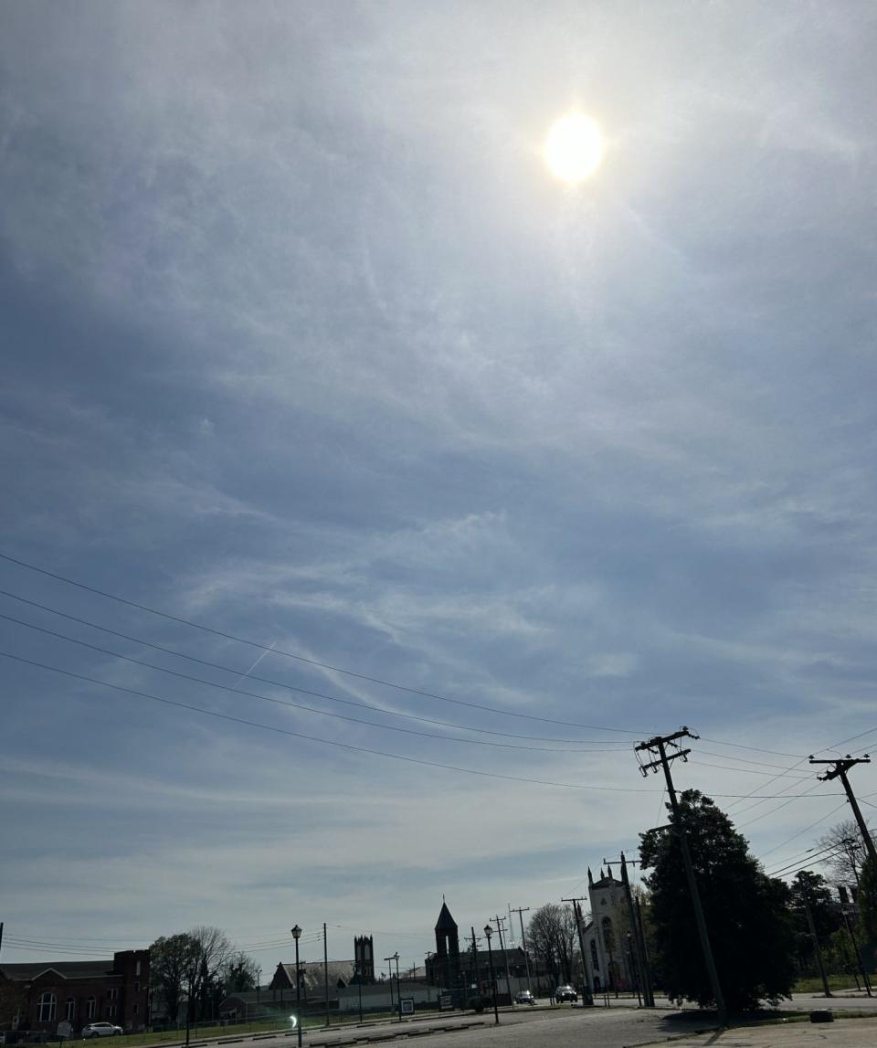 This quickly taken photo shows how the solar eclipse at its peak would have looked to the unprotected eye Monday, April 8, 2024, along Halifax Street in downtown Petersburg.