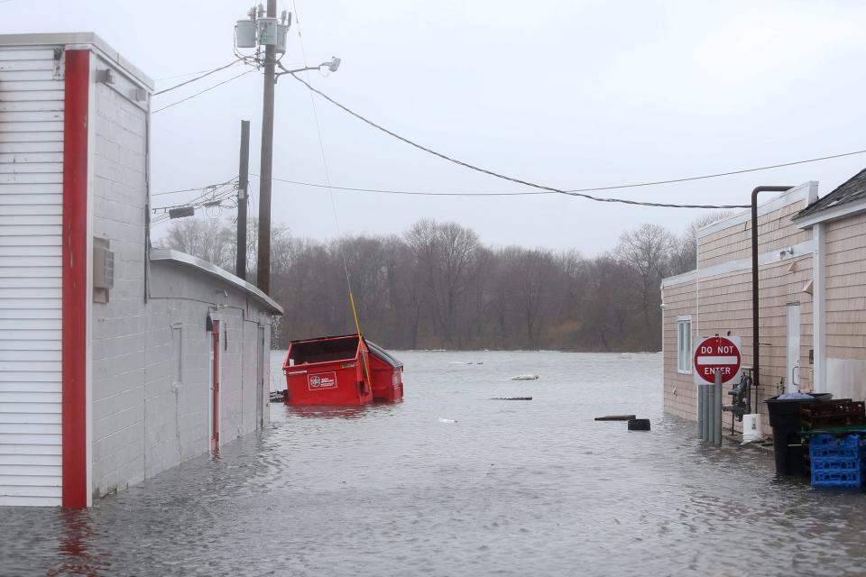 A winter storm rips through Portsmouth leaving streets flooded and damage from high winds on Jan. 17, 2022.