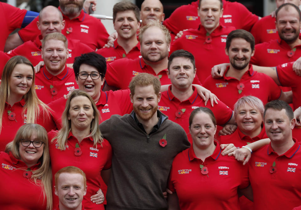 Britain's Prince Harry poses for a photo during the launch of the team selected to represent the UK at the Invictus Games The Hague 2020, in London, Tuesday, Oct. 29, 2019. (AP Photo/Frank Augstein)