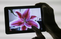 The iPad Mini is shown in San Jose, Calif., Tuesday, Oct. 23, 2012. The device has a screen that's about two-thirds the size of the full-size model, and Apple says it will cost $329 and up. (AP Photo/Marcio Jose Sanchez)