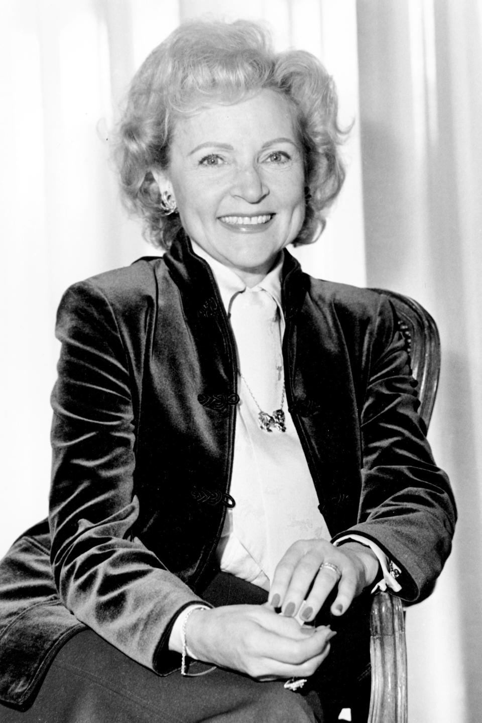 FILE - Actress Betty White poses for a portrait in Los Angeles, Calif., on March 5, 1982. Betty White, whose saucy, up-for-anything charm made her a television mainstay for more than 60 years, has died. She was 99. (AP Photo/Reed Saxon, File)