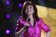 FILE - Naomi Judd performs at the CMA Music Festival in Nashville, Tenn., Saturday, June 13, 2009. Judd, the Kentucky-born matriarch of the Grammy-winning duo The Judds and mother of Wynonna and Ashley Judd, has died, her family announced Saturday, April 30, 2022. She was 76. (AP Photo/Josh Anderson, File)