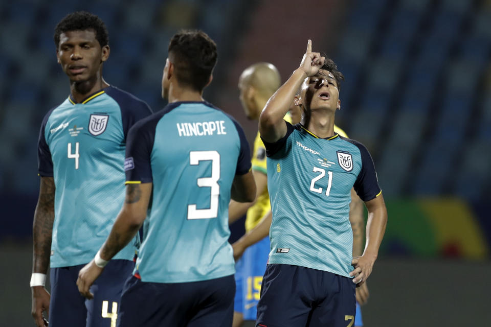 Ecuador's Alan Steven Franco, right, reacts at the end of a Copa America soccer match against Brazil at Olimpico stadium in Goiania, Brazil, Sunday, June 27, 2021. The match ended in a 1-1 draw, with Ecuador making it to the quarterfinals. (AP Photo/Eraldo Peres)