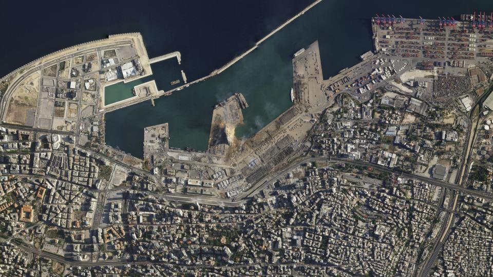 This satellite image taken on Wednesday Aug. 5, 2020 shows the port of Beirut and the surrounding area in Lebanon following a massive explosion on Tuesday. Residents of Beirut confronted a scene of utter devastation a day after a massive explosion at the port rippled across the Lebanese capital, killing at least 100 people, wounding thousands and leaving entire city blocks blanketed with glass and rubble. (Planet Labs Inc. via AP)