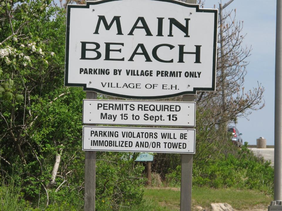 In this photograph taken Monday, May, 13, 2013, a sign lists rules and regulations to enter Main Beach in East Hampton, N.Y., stands ready to greet summer visitors. Main Beach is number one on the 2013 list of Top 10 Beaches produced annually by coastal expert Stephen P. Leatherman, also known as "Dr. Beach," director of Florida International University's Laboratory for Coastal Research. (AP Photo/Frank Eltman)