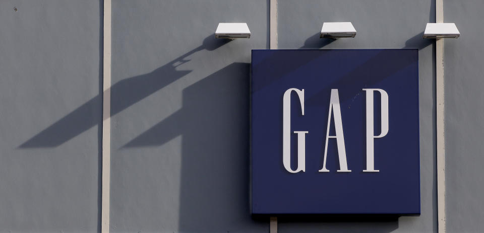 In this Feb. 21, 2012, a Gap logo is diplayed on a store at the Derby Street Shoppes complex in Hingham, Mass. Gap Inc. reports quarterly financial results Thursday, Feb. 23, 2012, after the market close. (AP Photo/Stephan Savoia)