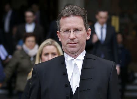 Britain's Attorney General Jeremy Wright returns to the High Court during a legal challenge to force the British government to seek parliamentary approval before starting the formal process of leaving the European Union, in London, Britain, October 13, 2016. REUTERS/Stringer