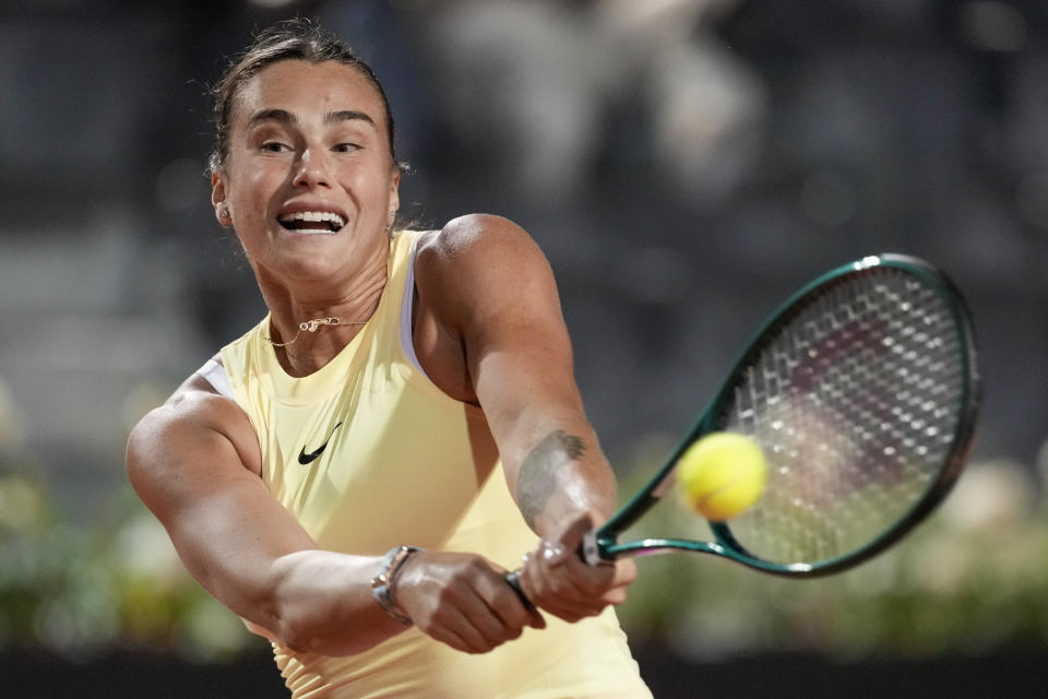 Belarus' Aryna Sabalenka returns the ball to Ukraine's Elina Svitolina at the Italian Open tennis tournament, in Rome, Monday, May 13, 2024. (AP Photo/{photograper)