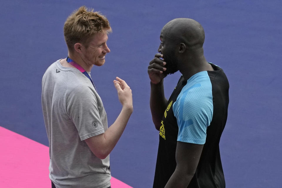 Inter Milan's Romelu Lukaku, right, and Manchester City's Kevin De Bruyne chat after an Inter training session at the Ataturk Olympic Stadium in Istanbul, Turkey, Friday, June 9, 2023. Manchester City and Inter Milan are making their final preparations ahead of their clash in the Champions League final on Saturday night. (AP Photo/Thanassis Stavrakis)