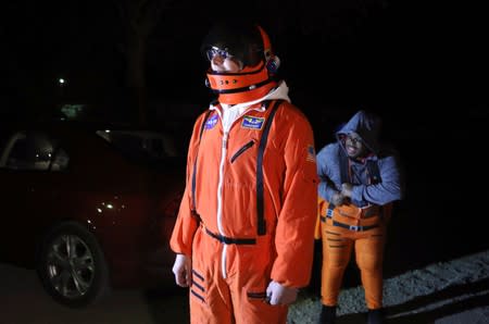 Attendees wear space travel and alien themed costumes as an influx of tourists responding to a call to 'storm' Area 51, a secretive U.S. military base believed by UFO enthusiasts to hold government secrets about extra-terrestrials, is expected in Rachel, N