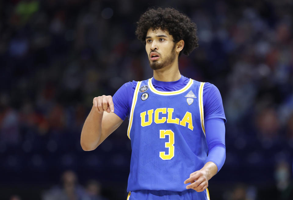 INDIANAPOLIS, INDIANA - APRIL 03: Johnny Juzang #3 of the UCLA Bruins reacts in the first half against the Gonzaga Bulldogs during the 2021 NCAA Final Four semifinal at Lucas Oil Stadium on April 03, 2021 in Indianapolis, Indiana. (Photo by Jamie Squire/Getty Images)