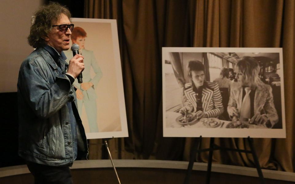 Rock in 2017 with a photograph of David Bowie and Mick Ronson, at a screening in New York of the documentary Shot: The Psycho-Spiritual Mantra of Rock - JP Yim