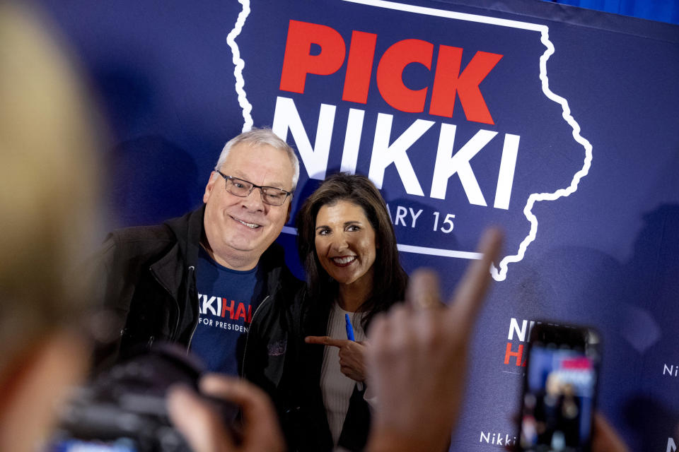 Republican presidential candidate former UN Ambassador Nikki Haley takes a photograph with an audience member after speaking at Toast in Ankeny, Iowa, Thursday, Jan. 11, 2024. (AP Photo/Andrew Harnik)
