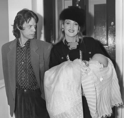 <p>Dave Hogan/Hulton Archive/Getty</p> Mick Jagger and Jerry Hall