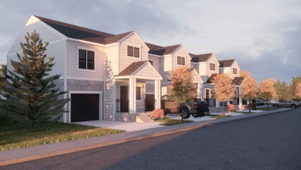 An architectural rendering shows Hamburg Village Townhomes off M-36 in Hamburg Township.