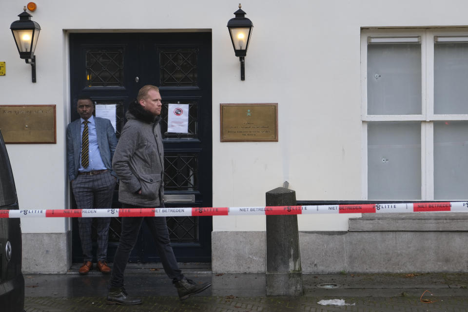 Bullet impacts are seen in the windows of Saudi Arabia's embassy in The Hague, Netherlands, Thursday, Nov. 12, 2020, after several shot were fired at the building early in the morning. Nobody was injured and police were investigating. (AP Photo/Mike Corder)