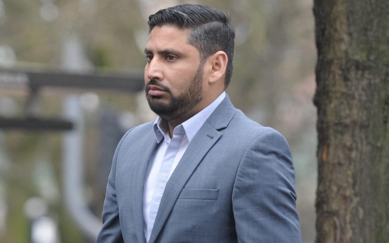 Cricketer Mustafa Bashir leaving Manchester Crown Court, where he pleaded guilty to charges related to attempting to pour bleach down his partner's throat - Cavendish Press/Pat Isaacs