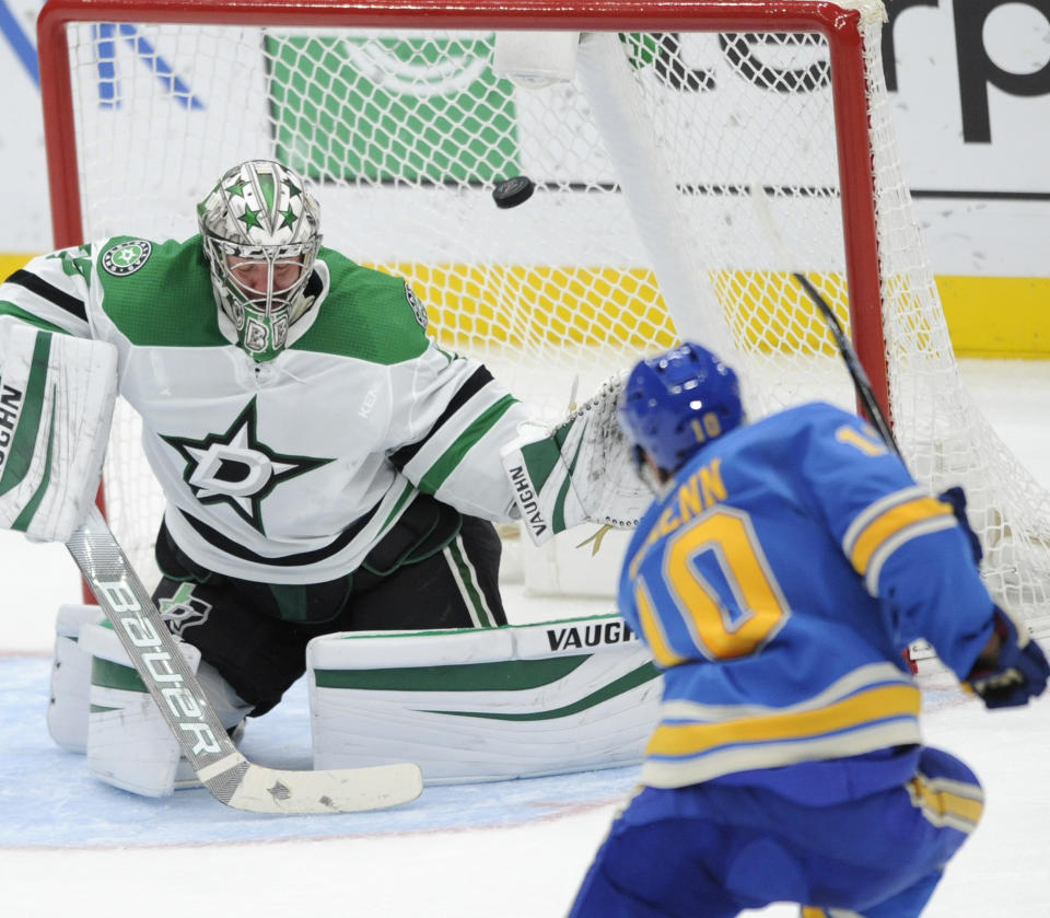 St. Louis Blues' Brayden Schenn (10) scores against Dallas Stars' Anton Khudobin (35), of Russia, during the second period of an NHL hockey game, Saturday, Feb. 29, 2020, in St. Louis. (AP Photo/Bill Boyce)