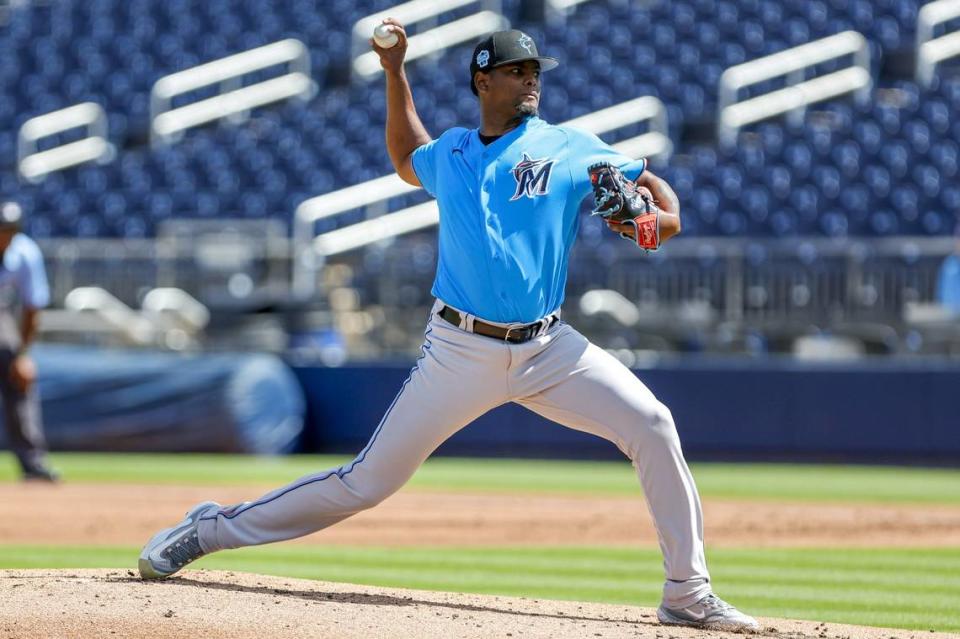 Miami Marlins starting pitcher Edward Cabrera (27) delivers a pitch during the first inning against the Washington Nationals at The Ballpark of the Palm Beaches on March 2, 2023.