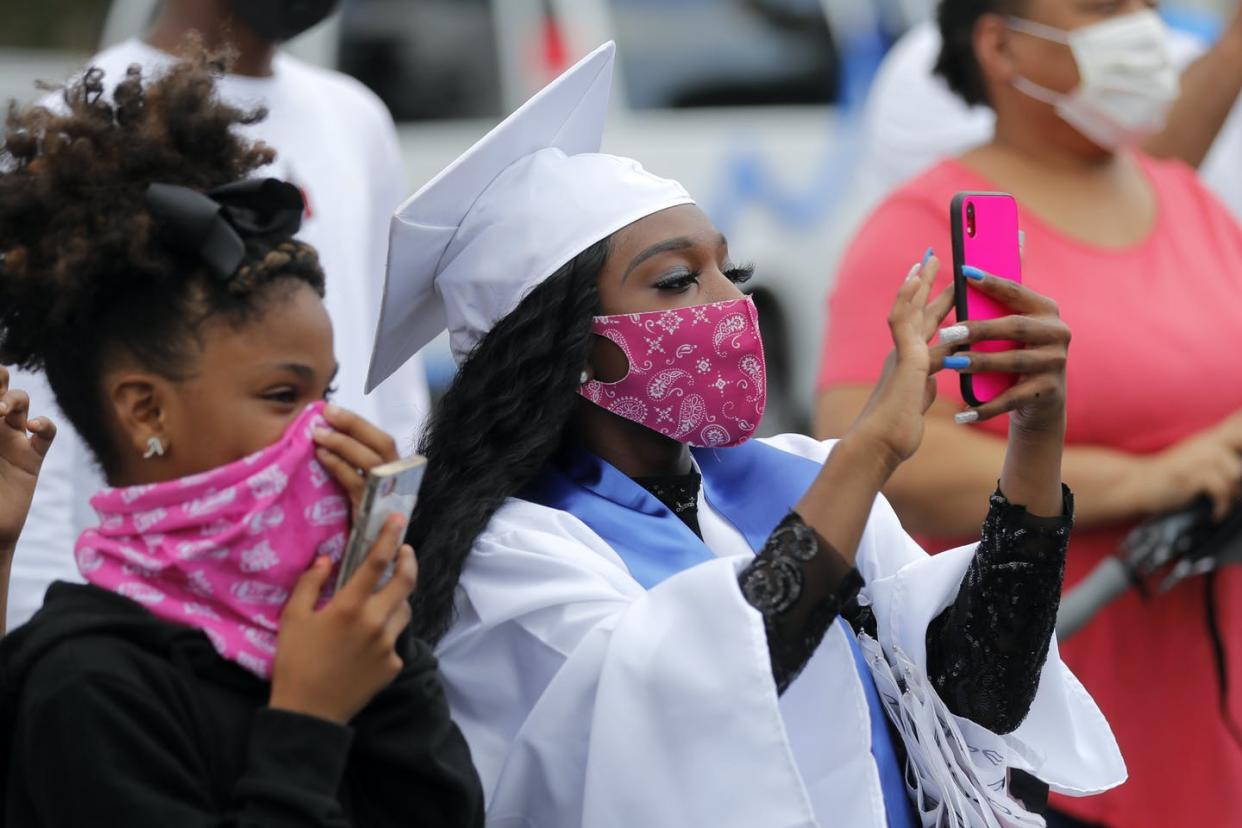 <span class="caption">COVID-19 has altered nearly every aspect of higher education.</span> <span class="attribution"><a class="link " href="http://www.apimages.com/metadata/Index/Virus-Outbreak-New-Orleans-Graduation/decbb9ee12974bf2b432bea0909dacb4/5/0" rel="nofollow noopener" target="_blank" data-ylk="slk:Gerald Herbert/AP;elm:context_link;itc:0;sec:content-canvas">Gerald Herbert/AP</a></span>