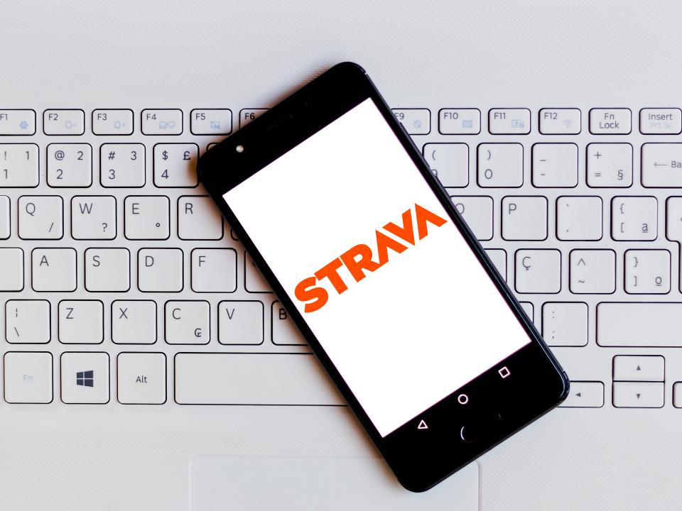 In this photo illustration, the Strava logo is seen displayed on a smartphone.