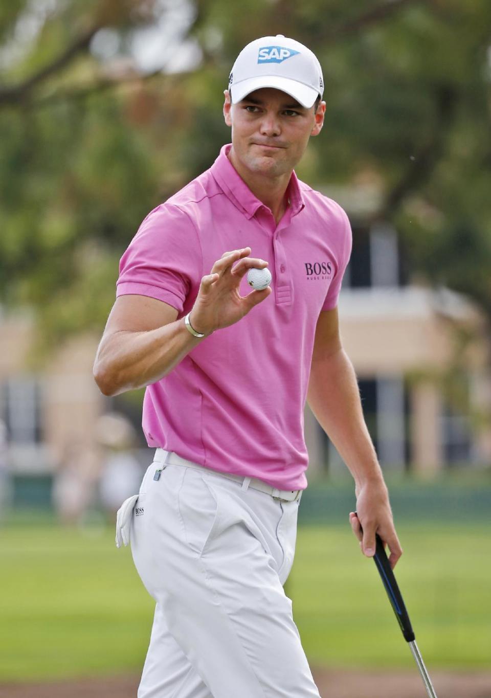 Martin Kaymer, of Germany, acknowledges the crowd after putting on the second hole during the third round of the Honda Classic golf tournament, Saturday, Feb. 25, 2017, in Palm Beach Gardens, Fla. (AP Photo/Wilfredo Lee)