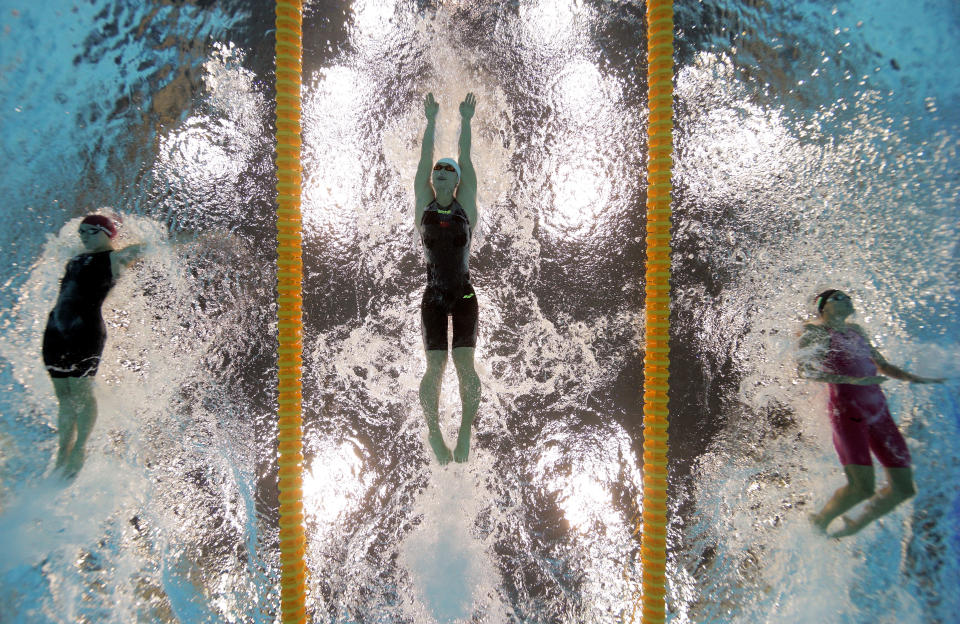 LONDON, ENGLAND - JULY 31: (L-R) Jemma Lowe of Great Britain, Zige Liu of China and Zsuzanna Jakabos of Hungary compete in the Women's 200m Butterfly heat 4 on Day 4 of the London 2012 Olympic Games at the Aquatics Centre on July 31, 2012 in London, England. (Photo by Adam Pretty/Getty Images)