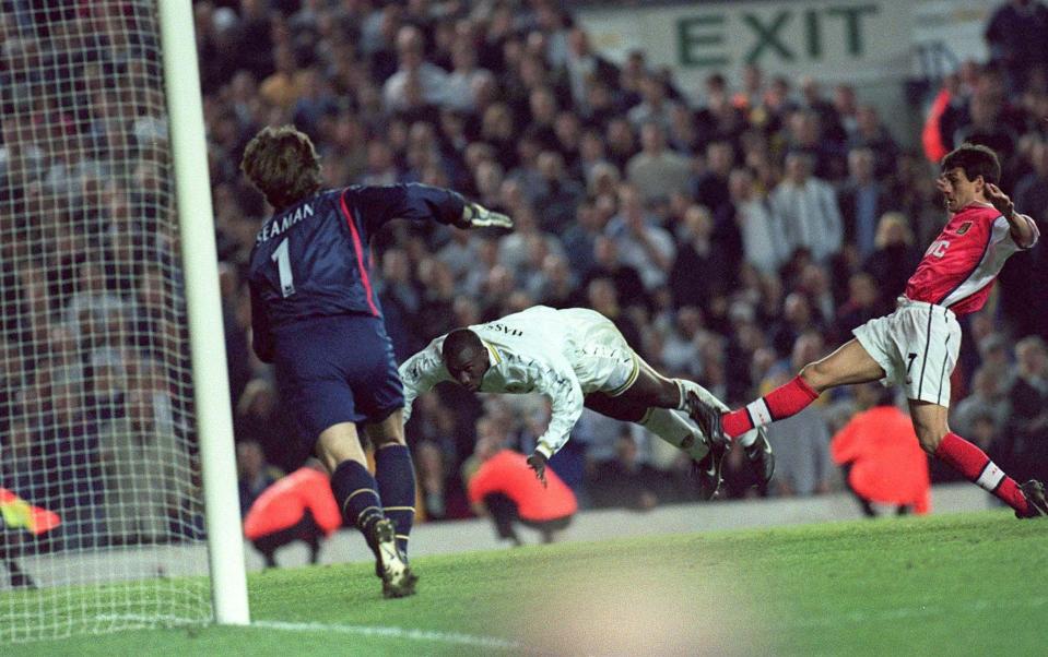 Jimmy Floyd Hasselbaink scores with a diving header