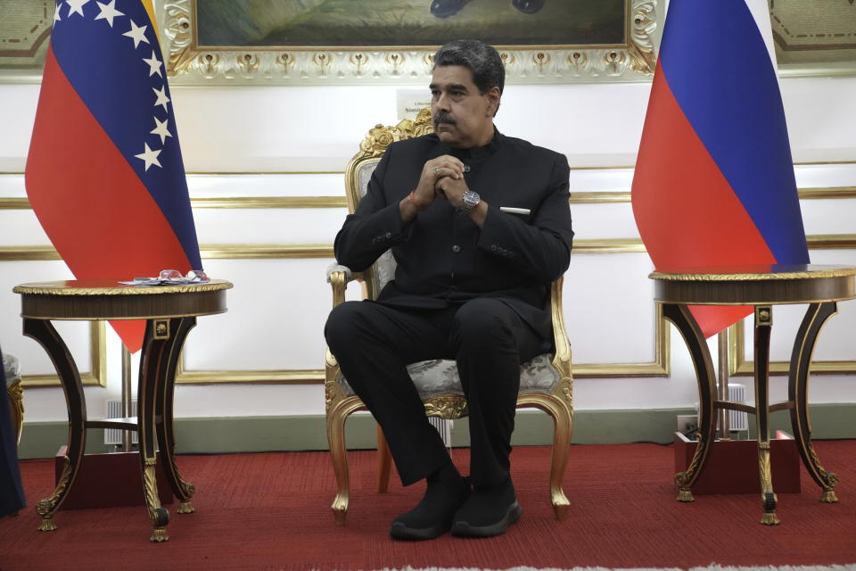 Venezuelan President Nicolas Maduro meets with Russia's Foreign Minister Sergey Lavrov at Miraflores presidential palace in Caracas, Venezuela, Tuesday, Feb. 20, 2024. (AP Photo/Ariana Cubillos)