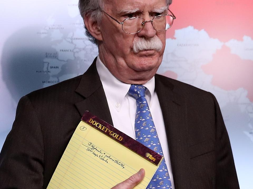 Trump aide John Bolton reveals notepad reading '5,000 troops to Colombia', as US announces fresh Venezuela sanctions