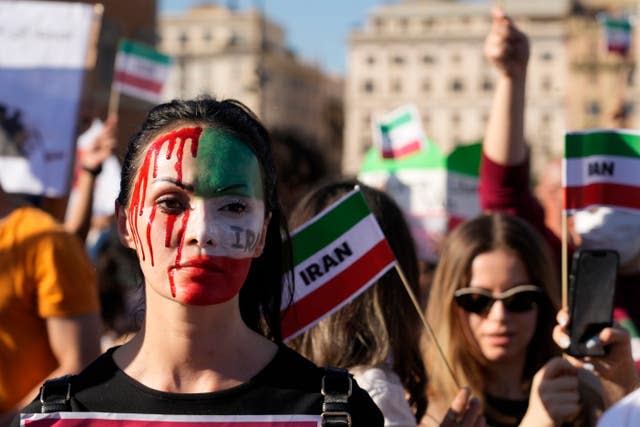 Protesters hold a rally in central Rome against the Iranian regime following the death in custody of Mahsa Amini 