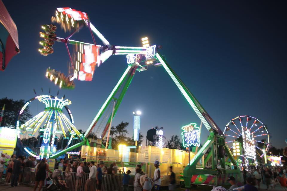 The ride called "The Beast" swings into action Friday at the Lenawee County Fair.