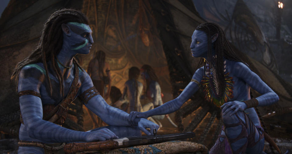 (L-R): Jake Sully and Neytiri in 20th Century Studios' AVATAR: THE WAY OF WATER. Photo courtesy of 20th Century Studios. Â© 2022 20th Century Studios. All Rights Reserved.